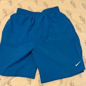 Nike youth boys size XL Blue Athletic Shorts with Swoosh